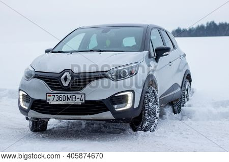 Grodno, Belarus-01.31.2021: Renault Capture Or Renault Captur Suv On A Winter Road Against The Backg