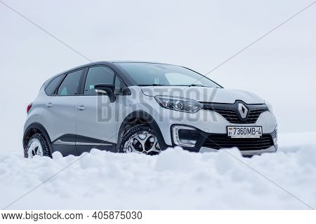 Grodno, Belarus-01.31.2021: Renault Capture Or Renault Captur Suv On A Winter Road Against The Backg