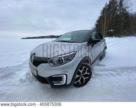 Grodno, Belarus-01.31.2021: Renault Capture Or Renault Captur Suv On A Winter Road Against The Backg