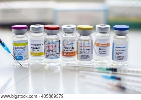Calgary, Alberta. Canada. Jan 31, 2021. Most Effective Covid-19 Vaccines Vials Bottles With Syringes