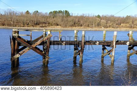 The Abandoned And Broken Fishing Pier By The Chesapeake Canal Near Middletown, Delaware, U.s.a