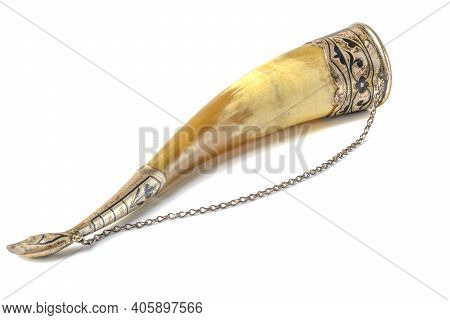 A Wine Horn Decorated With Chased Silver. White Isolated Background.