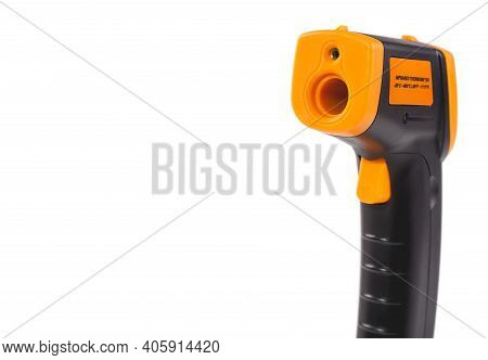 Yellow-black Pyrometer Isolated On White Background. A Device For Non-contact Temperature Measuremen