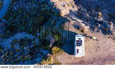 Caravan With Solar Panels On Roof Camping On Cliff Sea Shore. Mediterranean Region Of Villaricos, Al