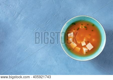 Miso Soup With Tofu And Spring Onions, Shot From The Top With Copy Space