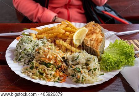 Fried Fish With Fries And Vegetable Salad