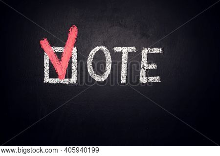 Checkbox With Word Vote On Blackboard. Voiting Concept