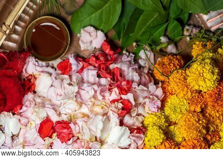 Pooja Thali Full Of Marigold Flowers, Petals, Leaves And Chandan For Pushpanjali On Vasant Panchami 