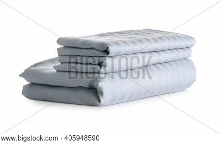 Stack Of Clean Bed Sheets Isolated On White