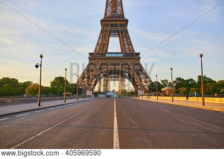 Scenic View Of Eiffel Tower Over Iena Bridge. Empty Streets Of Paris Without Tourists Duing Quaranti