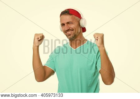 Perfect Sound Concept. Electronic Dance Music And House Tracks. Guy In Cap Listen Music Stereo Headp