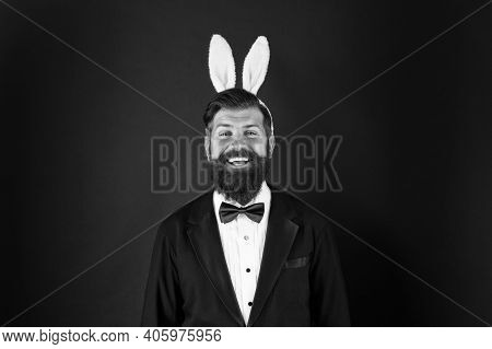 Hippity Hoppity Happy Easter. Bearded Man Celebrate Easter. Happy Businessman Wear Rabbit Ears. East