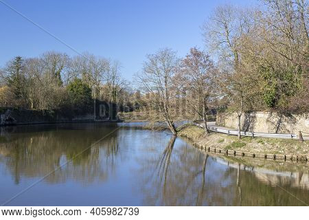 View From The Ramparts In Bergues, Northern France, Against A Blue Sky.