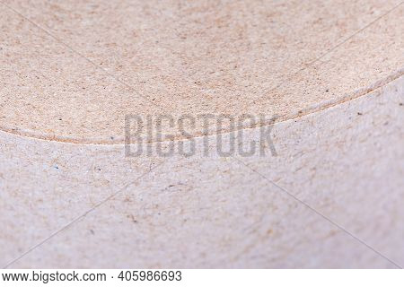 Fragment Of Roll Edge Of A Gray Brown Undyed Unbleached Soft Crepe Paper, Close-up In Selective Focu