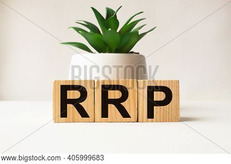A Word Rrp On Wooden Cubes. Business Concept. Business And Finance