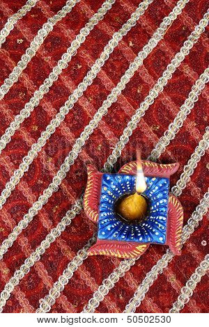 Handmade Indian Diwali Diya In Swastik Shape