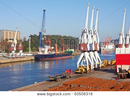 Port Craines And Large Ship