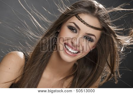 Smiling Girl With Blowing Hair