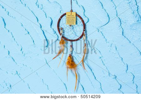 Dream catcher on Blue wall wave texture