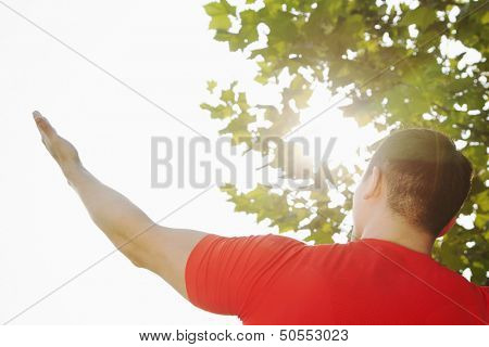 Young Muscular Man Stretching
