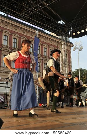 ZAGREB,CROATIA - JULY 19: Members of folk groups Oberes Murtal from Austria during the 47th International Folklore Festival in center of Zagreb,Croatia on July 19,2013