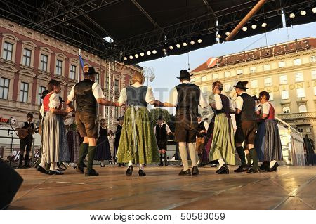 ZAGREB,CROATIA - JULY 19: Members of folk groups Oberes Murtal from Austria during the 47th International Folklore Festival in center of Zagreb,Croatia on July 19,2013