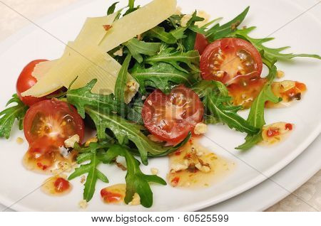Salad Of Arugula And Cherry Tomatoes With Parmesan Sauce