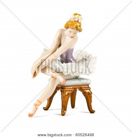 Porcelain Doll. Dancing Girl Over White Background