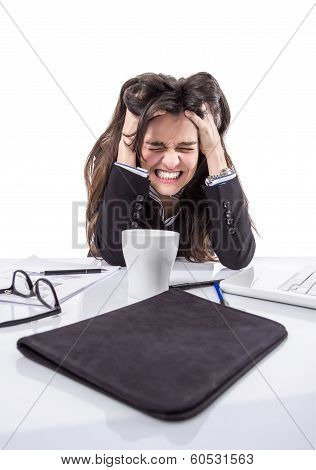 Stressed business woman pulling her hair