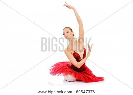 Professional bellet dancer posing at studio. Isolated over white background. 