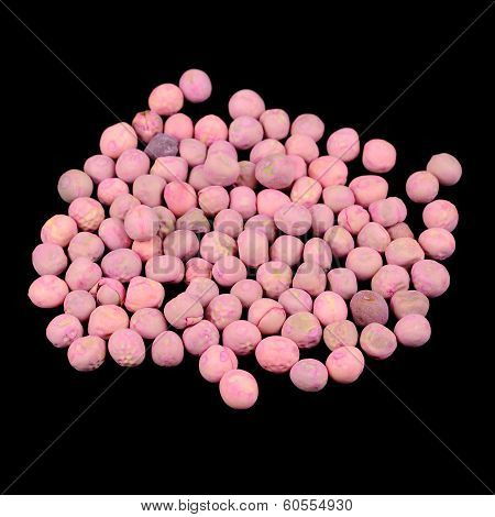 Treated Peas Seeds On Black Background