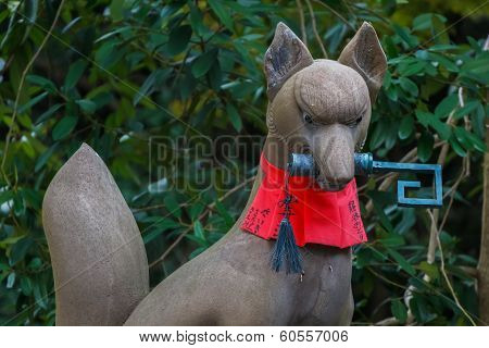 Kitsune sculpture at Fushimi Inari-taisha shrine in Kyoto