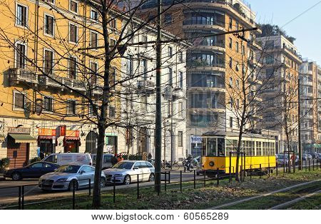 Old Traditional Yellow Tram On The Street Of Milan