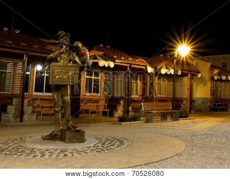 A monument of a hurdy-gurdy player in Tarnow