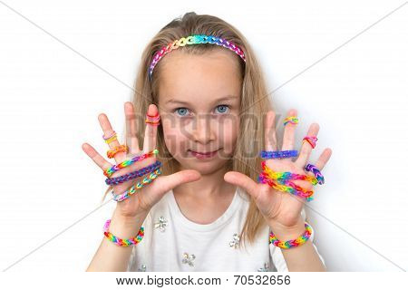 Loom bangs. Little girl demonstrated her craft work