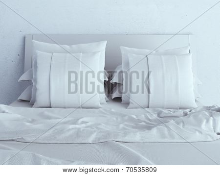 White pillows on a bed
