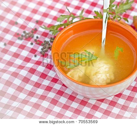 Soup with with semolina dumplings (noodles)