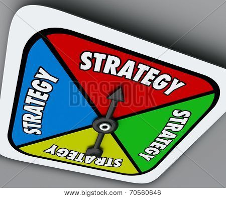 Strategy word on a board game spinner as your plan or turn to win the competition and achieve success in sports, business or life