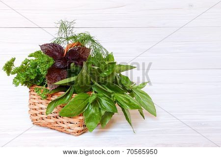 Spices And Herbs On A  Light Wooden Background