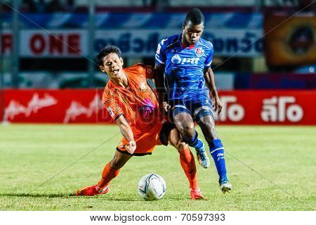 Sisaket Thailand-august 13: Alongkorn Pratoomwong Of Sisaket Fc. (orange) In Action During Thai Prem