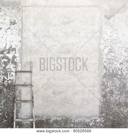 weathered wall with a wooden ladder