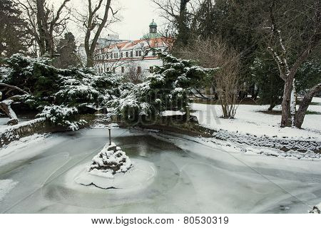 Topolcianky Castle With Frozen Lake In Winter