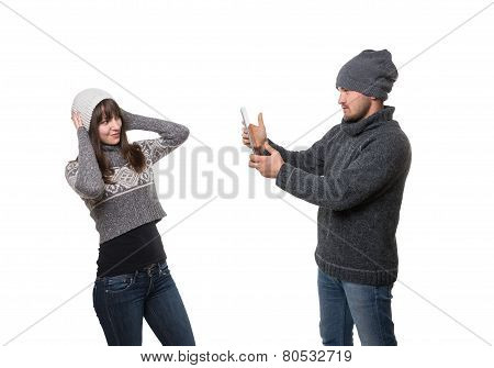 Boyfriend taking picture of his girlfriend