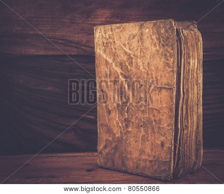 Vintage book on a wooden background 