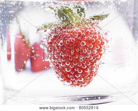 Strawberry In Mineral Water With Boobles