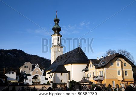 ST. GILGEN, AUSTRIA - DECEMBER 14: Parish Church in St. Gilgen on Wolfgang See lake, Austria on December 14, 2014.