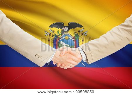 Businessmen Handshake With Flag On Background - Ecuador