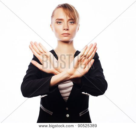 Business, finance and people concept: young business woman making stop desture. Isolated on white background.