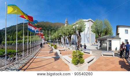 Sao Bento da Porta Aberta, Portugal. April 06, 2015: World flags around the Basilica. 2nd most visited sanctuary in Portugal. Pope Francis raised it to Basilica in the 400th anniversary in March, 21st