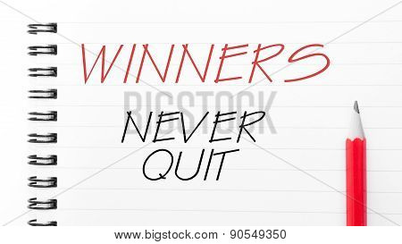 Winners Never Quit  Written On Notebook Page